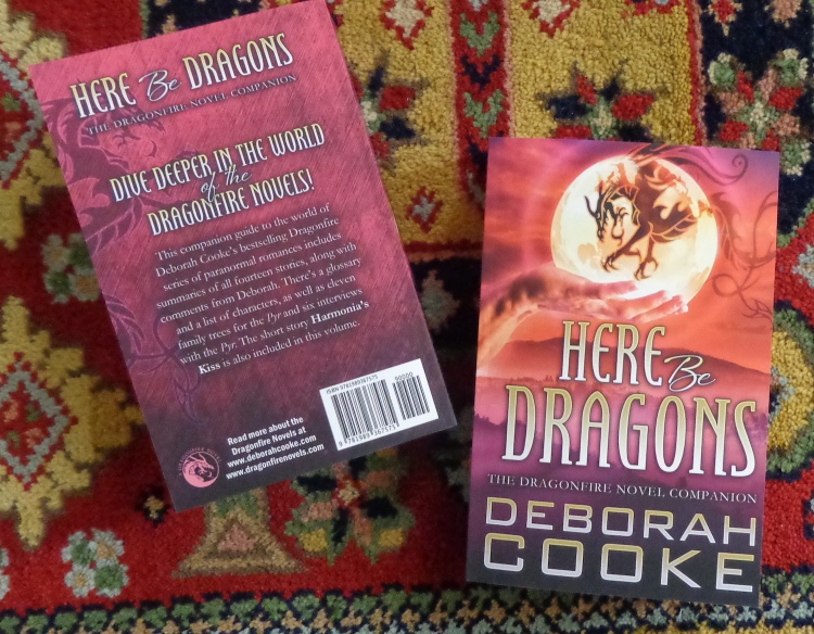 Here Be Dragons: The Dragonfire Novel Companion by Deborah Cooke in trade paperback